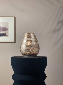 How do you clean a silver-plated lamp?